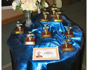 Photo of table displaying Golden Note Awards at the Recital